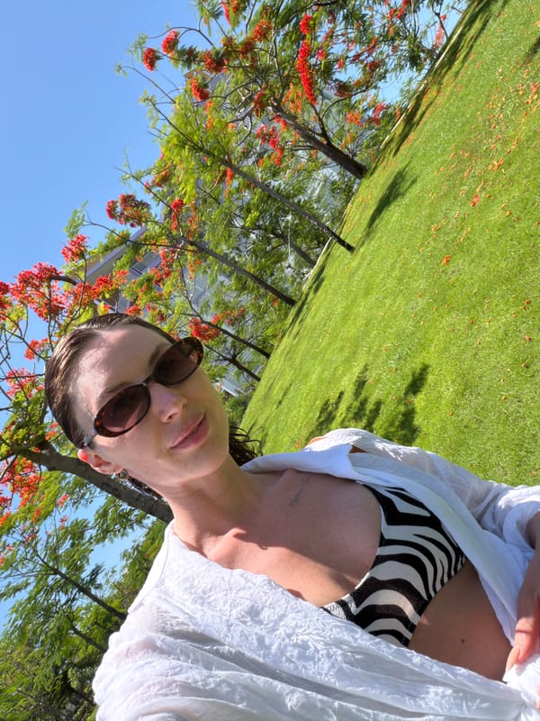 Woman poses for outdoor photo session in Vietnamese park