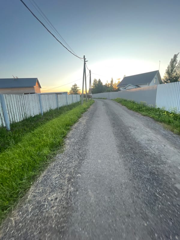 Evening stroll through a quiet Russian village at golden hour