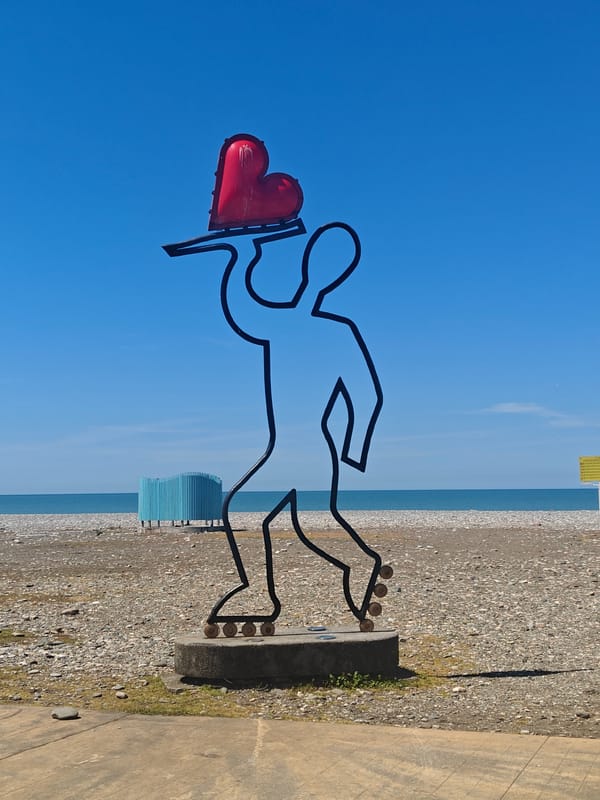 Morning scenes captured along Batumi's coastline and beach sculptures