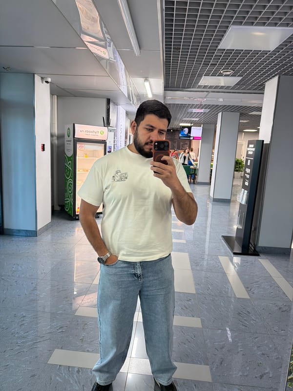 Man takes selfie in modern building in Krasnoyarsk