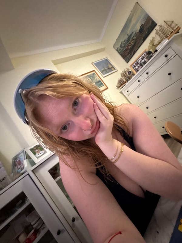 Friends gather for casual photo session in residential kitchen