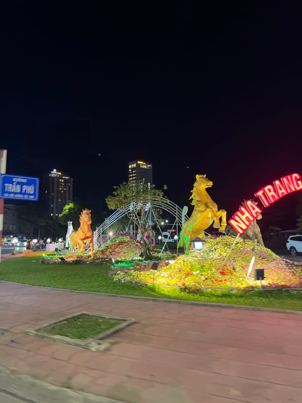 Golden horse street art installation illuminated in Nha Trang