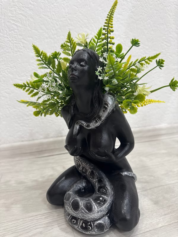Snake figurines, faux florals, and nail swatches in an Angarsk shop