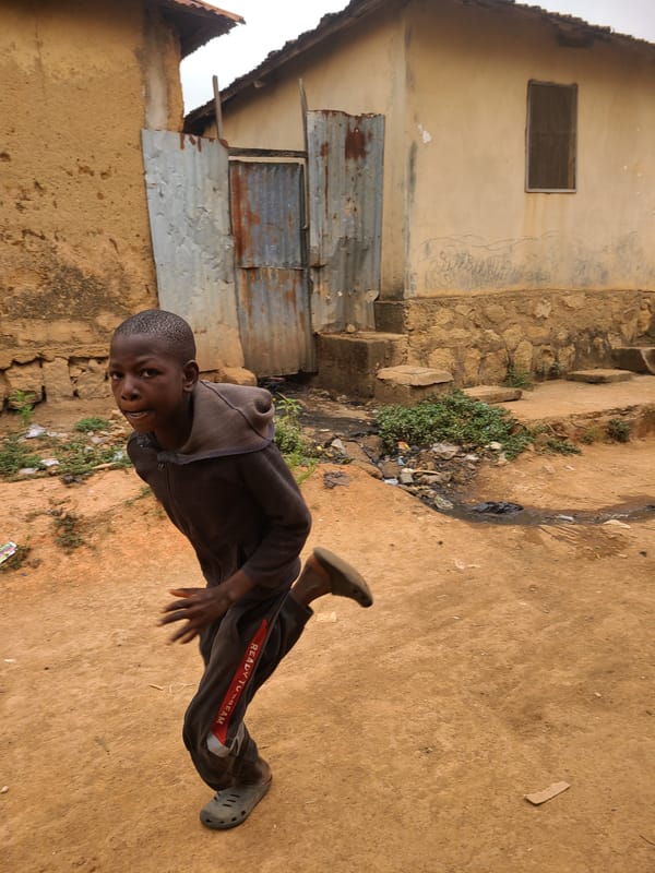 Daily life documented in Jos Nigeria residential neighborhood