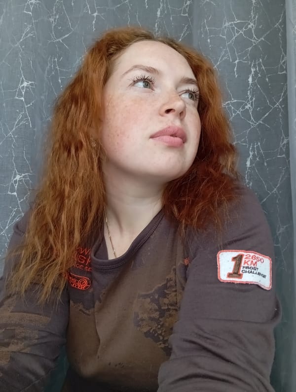 Red-haired woman observed in personal moments in Yurgamysh, Russia
