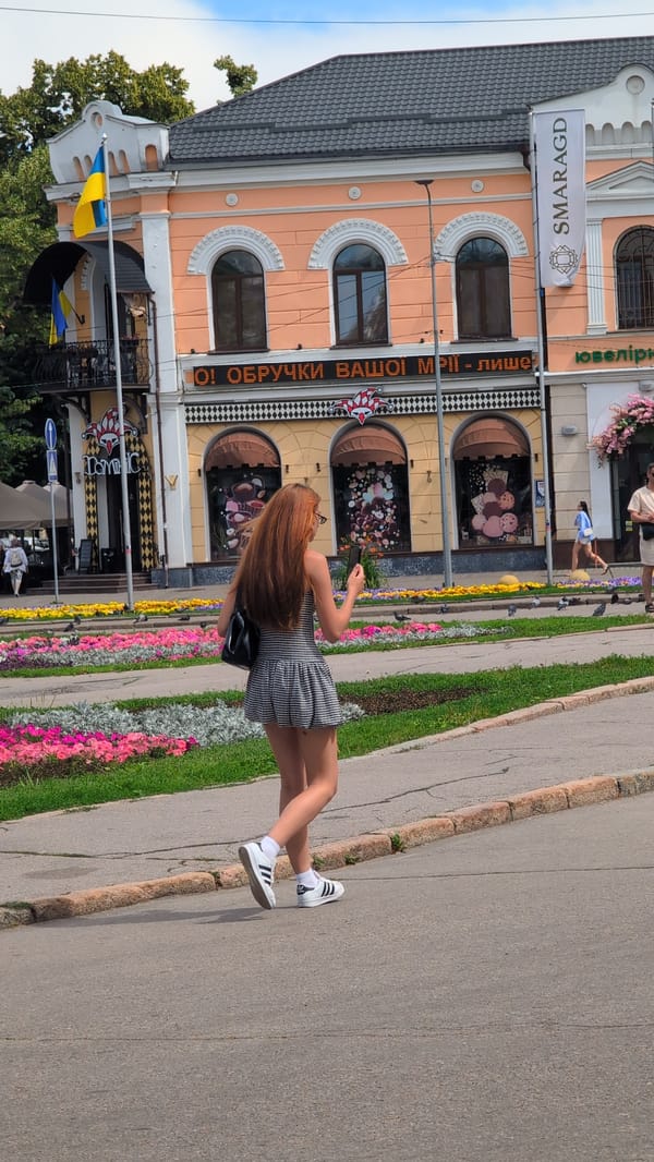 Afternoon street life along Poltava's neoclassical city center