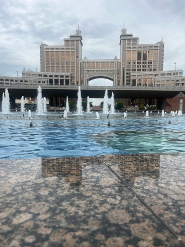 Strolling Astana's Bayterek plaza: fountains, bronze sculptures, landmark architecture