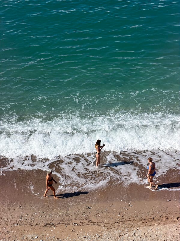 Early morning beach preparations captured at Boreti, Montenegro
