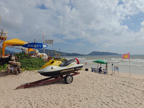 Patong Beach setup: lifeguard jet ski and umbrella rows