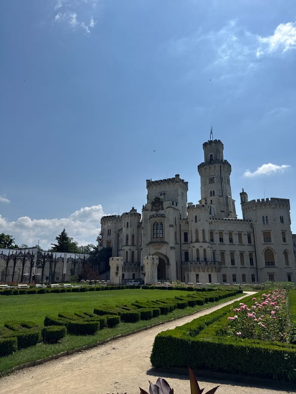 Exploring Hluboká Castle's grounds on a sunny June morning