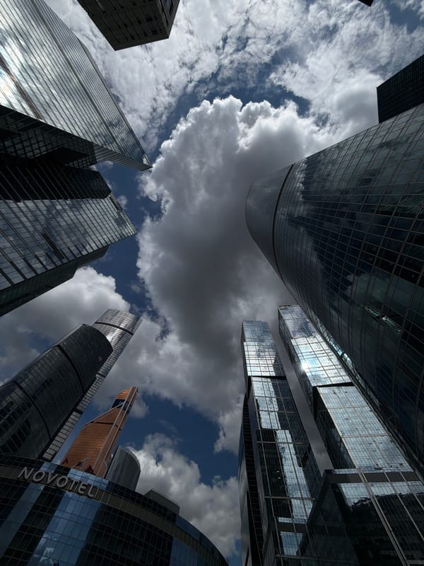 Glass skyscrapers photographed from below in Khimki, Russia