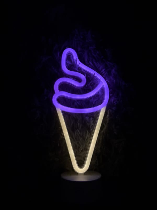 Neon wave sign spotted on interior wall in Murino