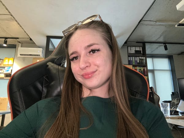 Casual selfie session at a home desk setup