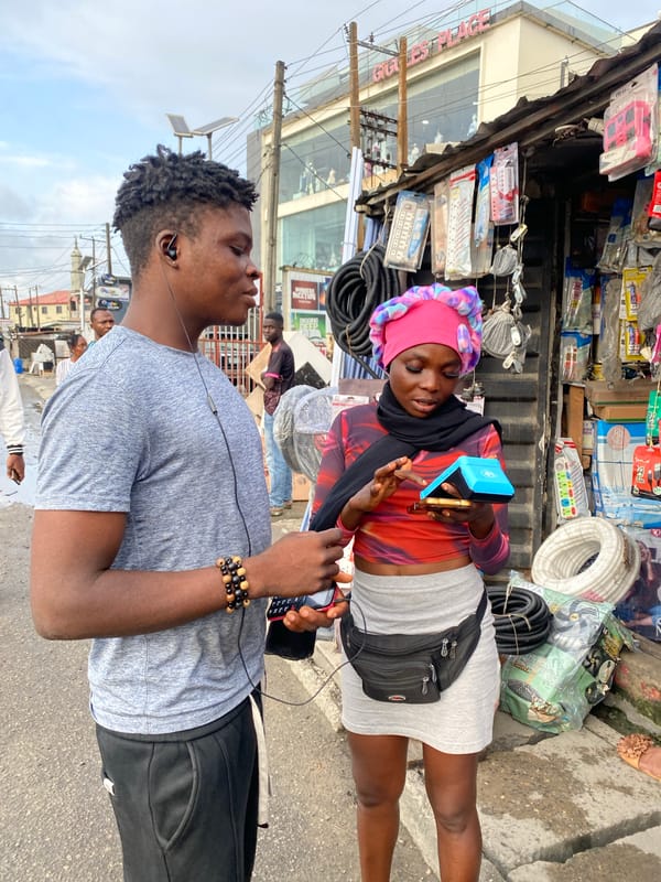 Street life and an MTN promo event in a busy tropical city