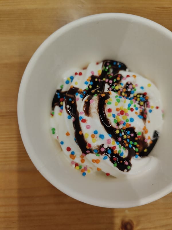 Soft-serve ice cream documented in paper cup