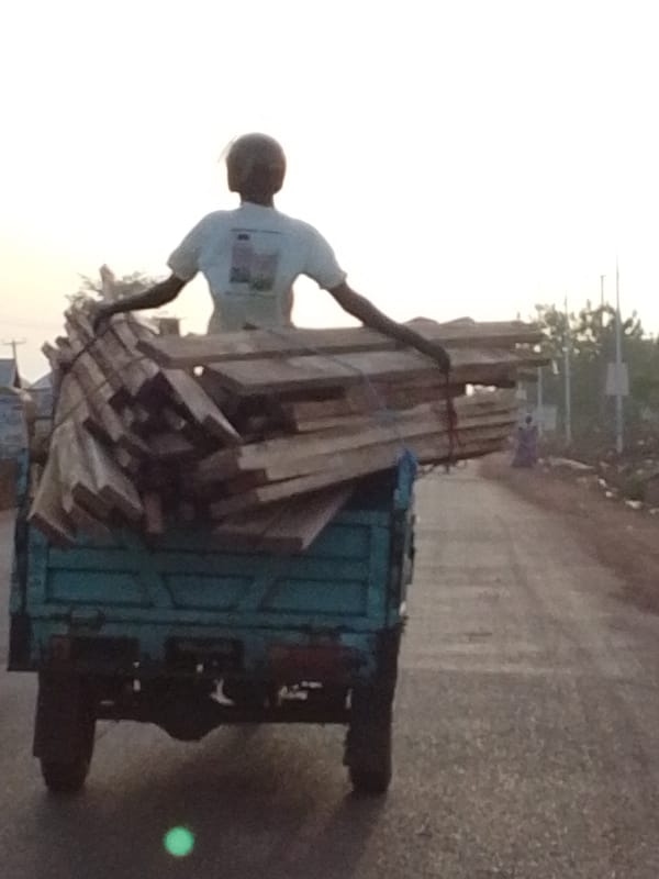 Local transport vehicles observed carrying cargo and passenger in Nyerizee