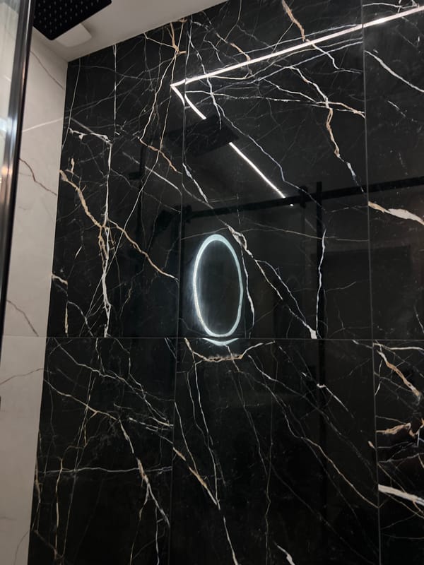 Black marble bathroom interior documented in Bansko, Bulgaria