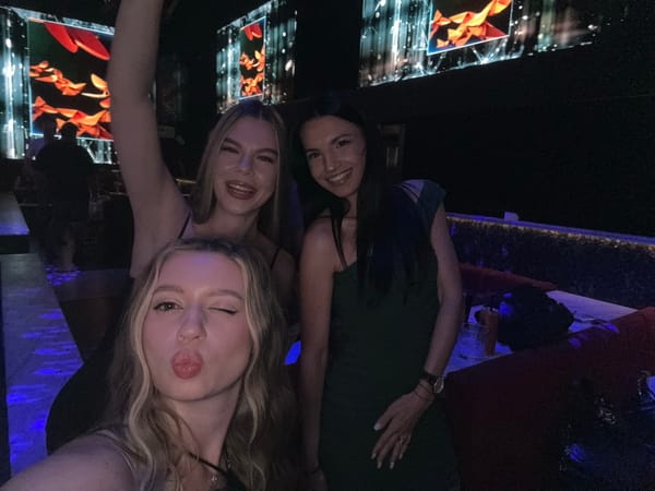 Night out at a Plovdiv club with glowing screens and selfies