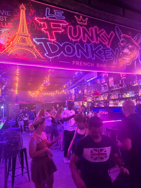 Drag performer entertains crowd at Le Donkey French Bar