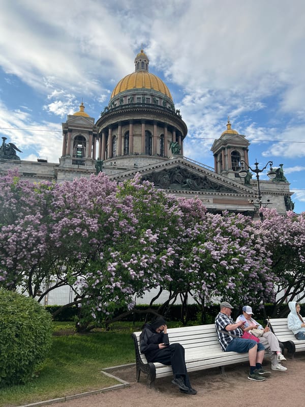Wedding couple photographed near St. Isaac's Cathedral, St. Petersburg
