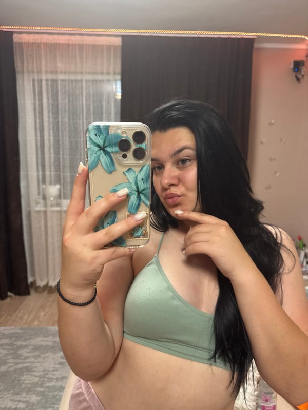 Woman takes selfies during evening skincare routine in Bulgaria
