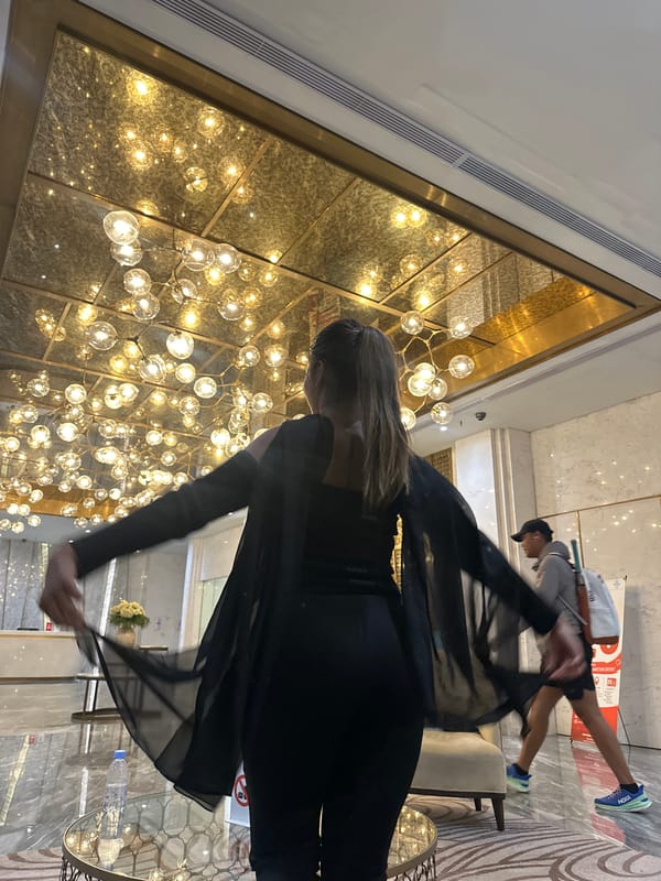 Woman poses for photo session in luxury Jakarta hotel lobby