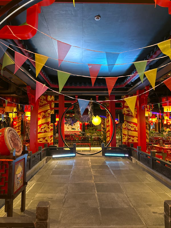 Traditional Chinese-themed venue pathway captured in unknown location