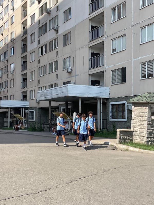 Quiet morning activity around a residential complex in Almaty