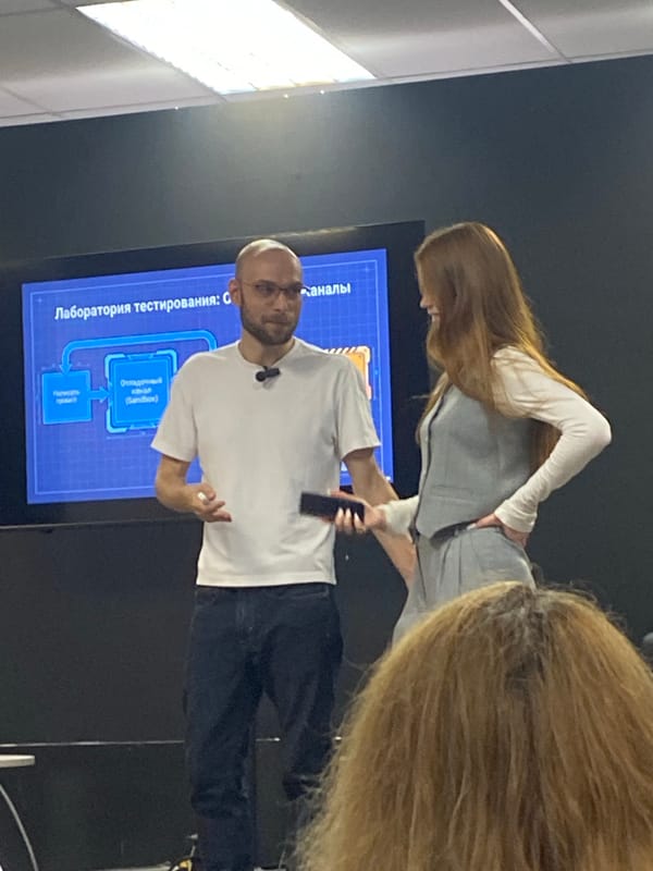 Indoor presentation with Russian-text diagram, Moscow