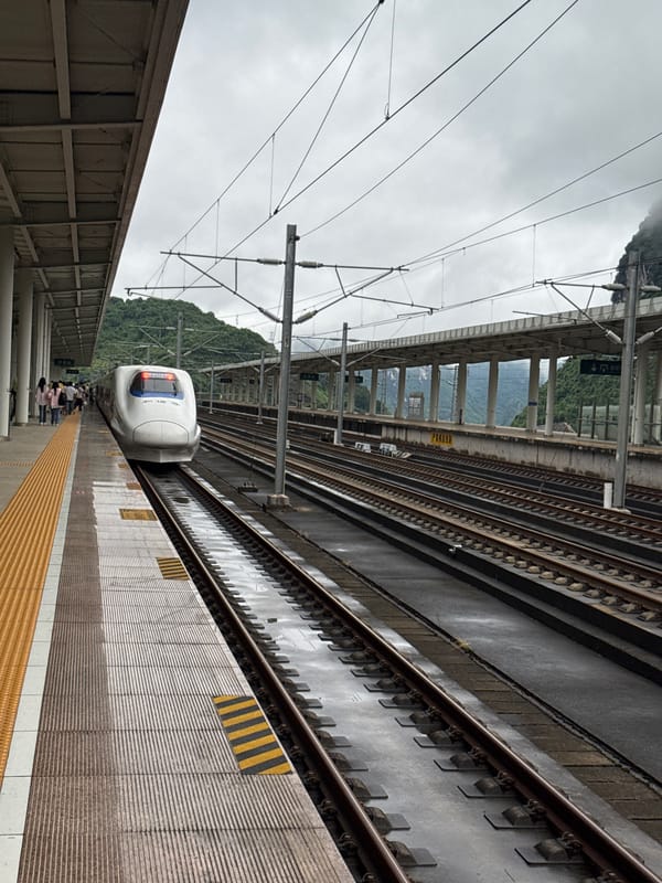 High-speed train stops at Guilin station for passenger boarding