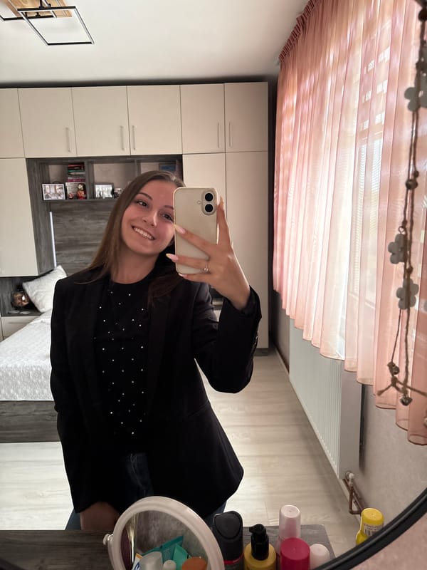 Young woman takes mirror selfies in Bulgarovo, Bulgaria