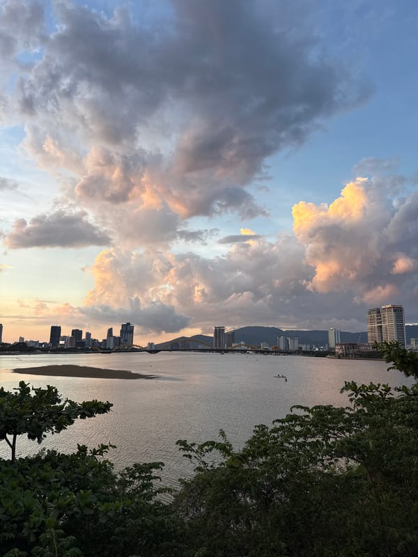Dramatic sunset illuminates Đà Nẵng waterfront and cityscape