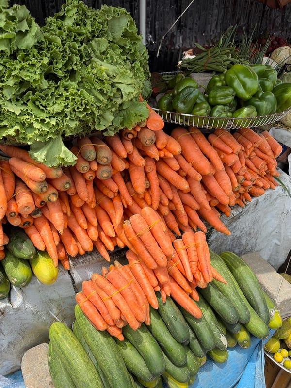 Fresh produce market stall documented in Igboefon, Nigeria