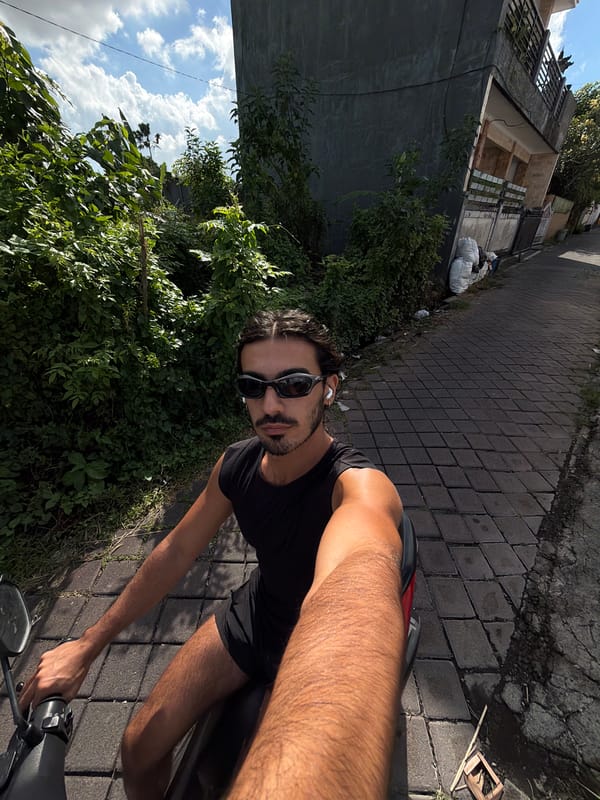 Motorcyclist Takes Selfies While Riding in North Kuta