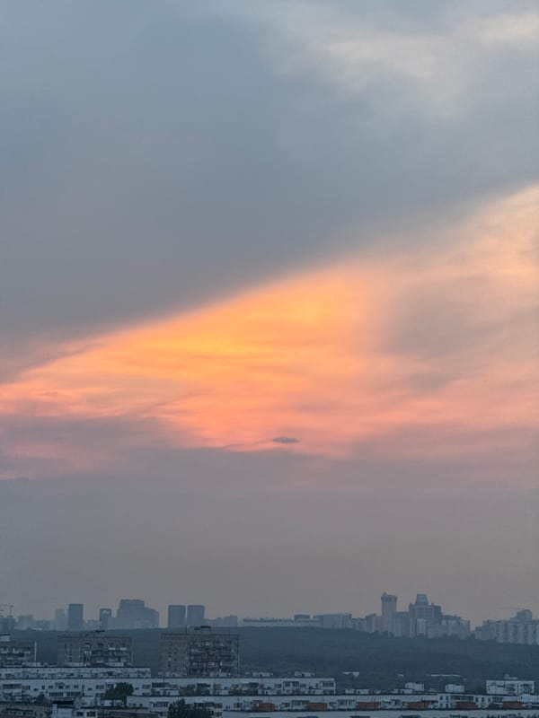 Vibrant sunset captured over Borduki cityscape at dusk