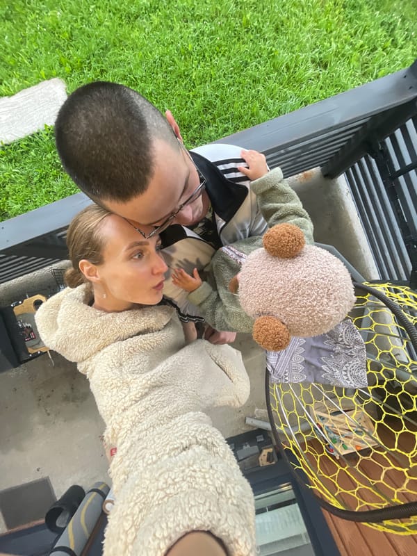 Family afternoon on a Podshivalovo balcony with a baby in a bear suit