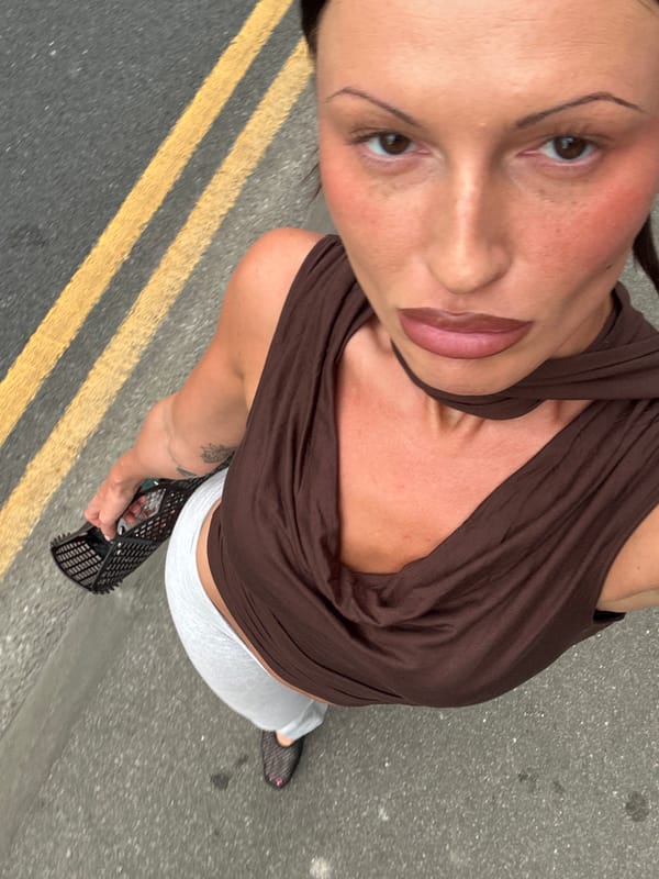 Woman with basket stands on double yellow lines in Tunbridge Wells
