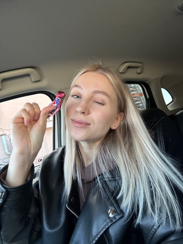 Woman takes selfies with candy in car in Izhevsk