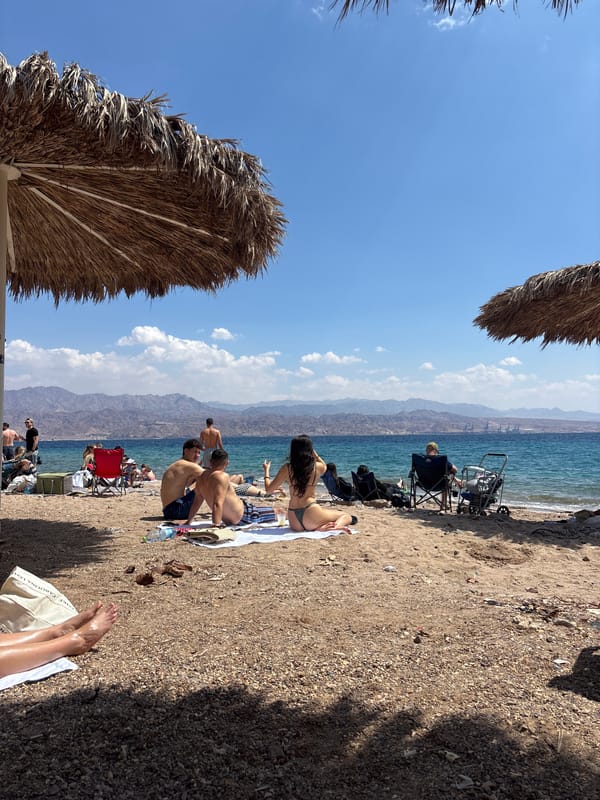 Woman enjoys morning beach time in Eilat, Israel