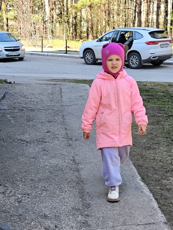Family playground activities documented across Chaikovsky, Russia morning hours
