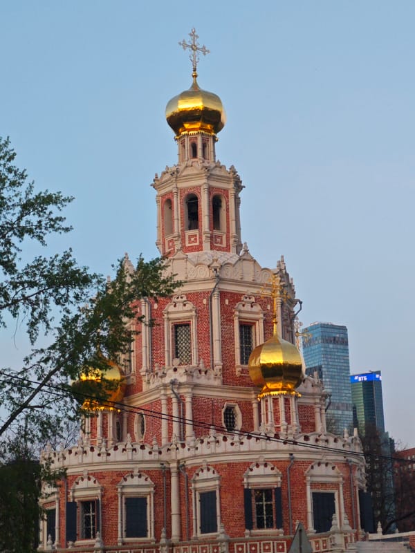 Moscow's historic Orthodox architecture juxtaposed with modern skyline development