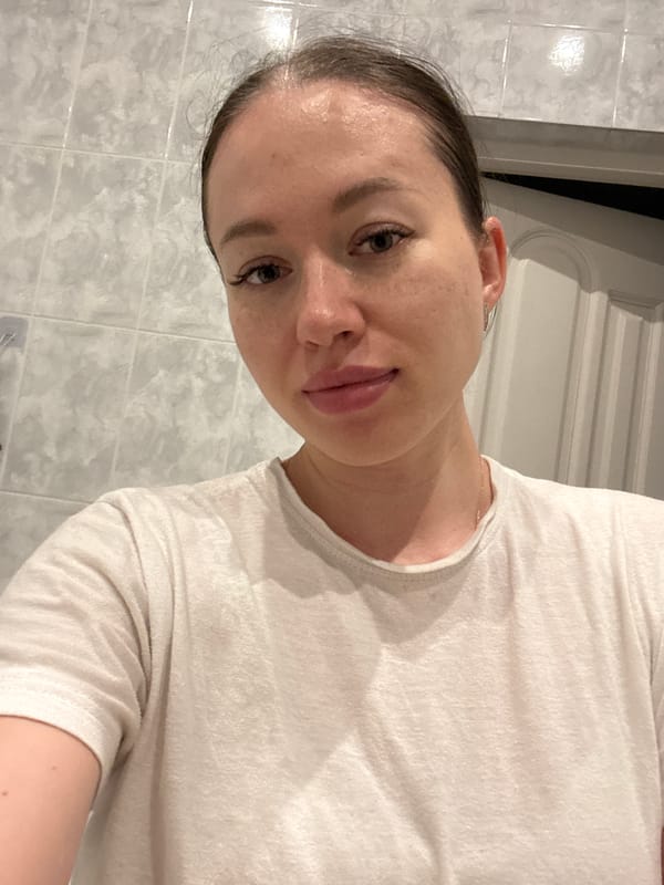Person photographed in bathroom setting in Ферма, Russia