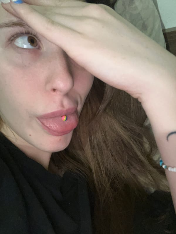 Person with tongue piercing photographed in Sofia