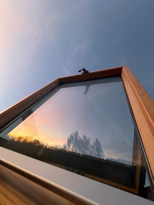 Aircraft contrails create sky patterns over Luxembourg