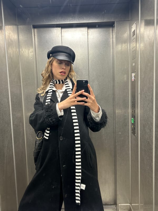 Woman takes selfie in elevator in Pantin, France