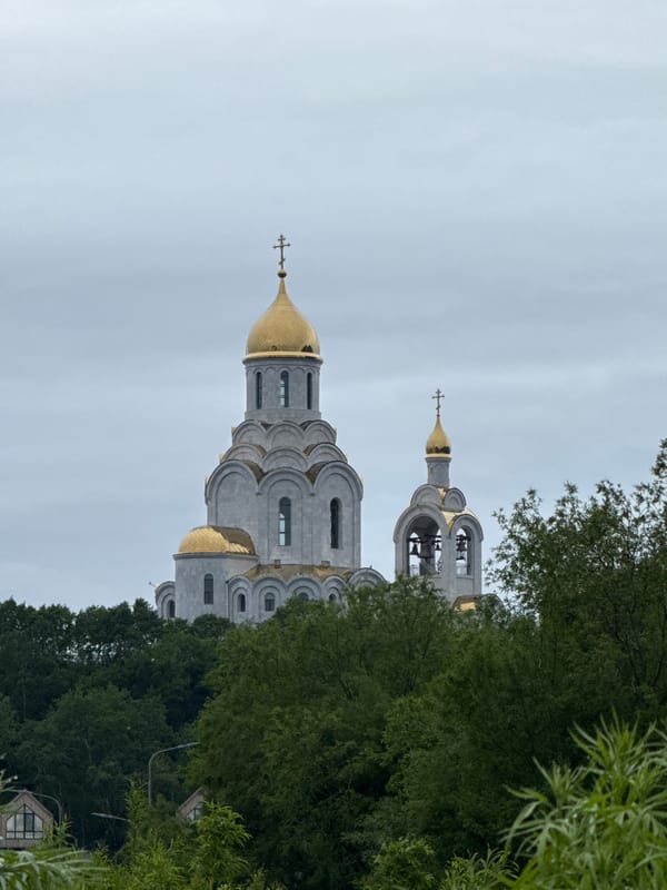 Orthodox church with golden domes on a hill in Kamchatka