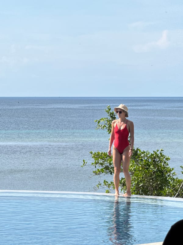 Resort guests share oceanfront facilities with grazing deer in Gerokgak