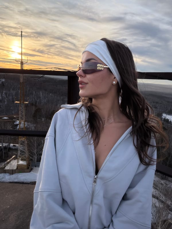 Woman poses on observation deck in Krasnoyarsk