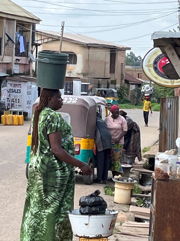 Afternoon street life and foot traffic in Jos, Nigeria