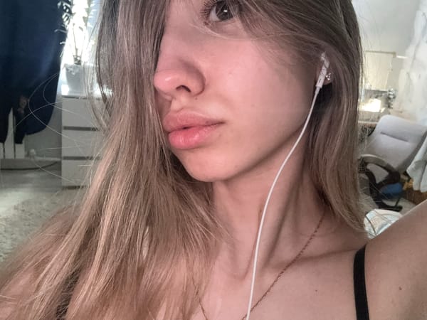 Woman photographs herself, companion in Noviy, Russia Wednesday morning